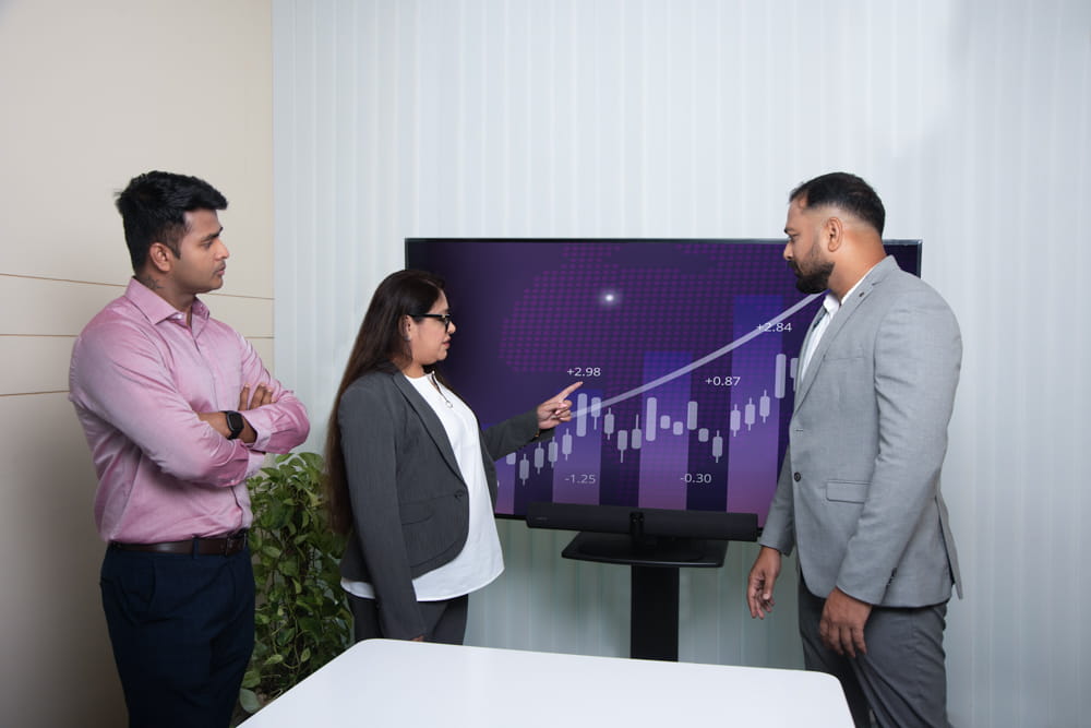 office colleague seeing graph on screen